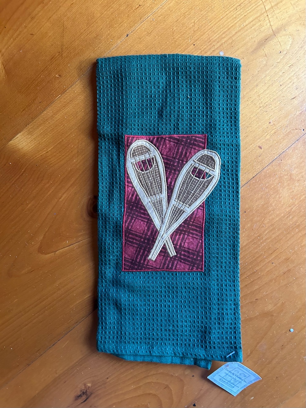 Green Waffle Weave Kitchen Towel with Appliqué Snowshoe Patch